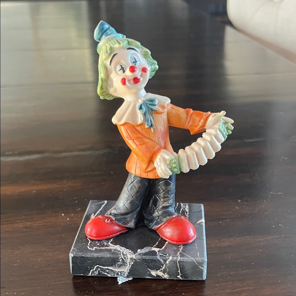 Colorful Clown Figurine on Marble Base